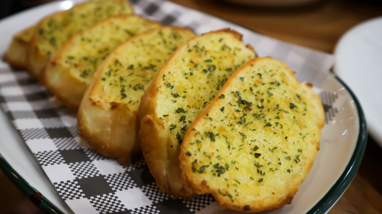 Garlic bread being made