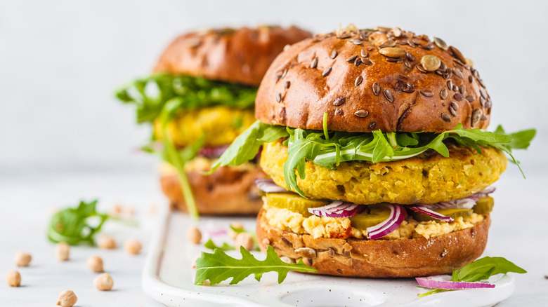 Vegan chickpea burger with arugula 