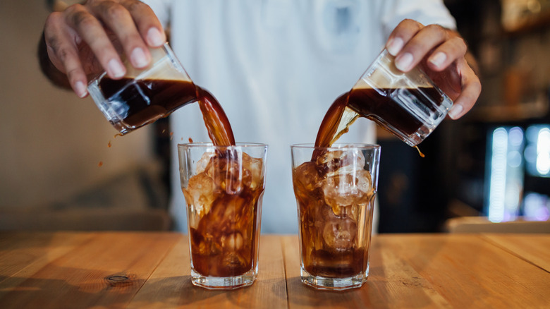 coffee being poured on ice