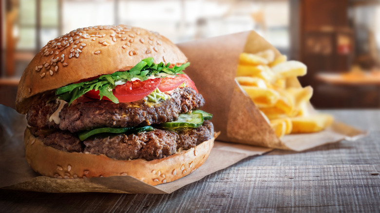 Fast casual restaurant burger and french fries on a table