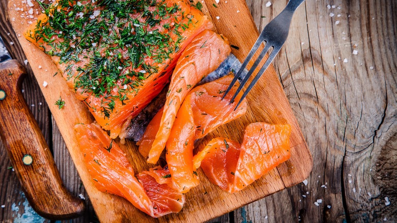 smoked salmon on a cutting board