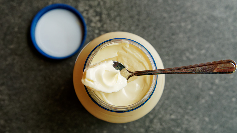 Opened jar of mayonnaise
