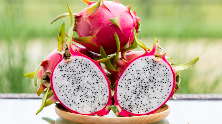 Pitaya on a wooden bowl