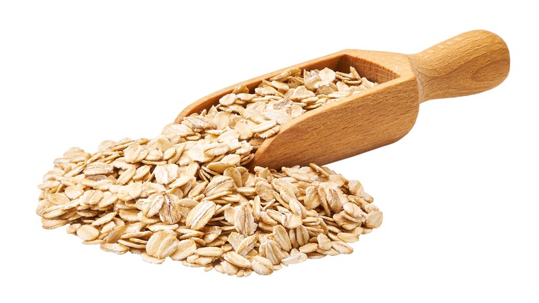 Scoop of raw oatmeal