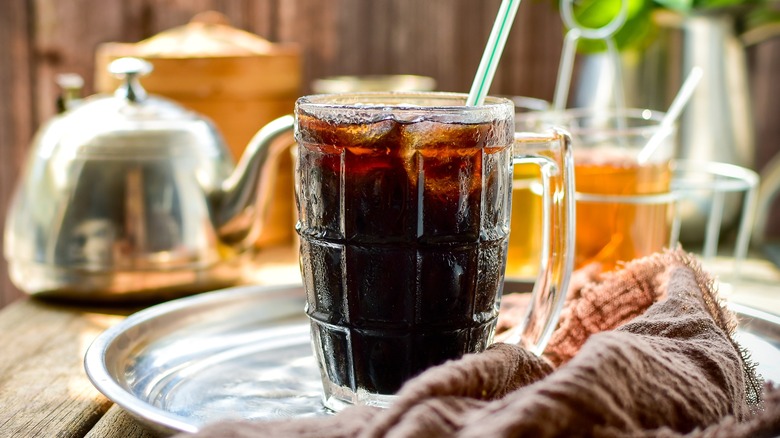 Thai iced black coffee on table