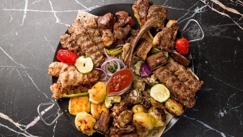 Platter of cooked BBQ meats