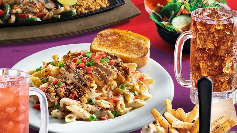 table full of Chili's food and drinks