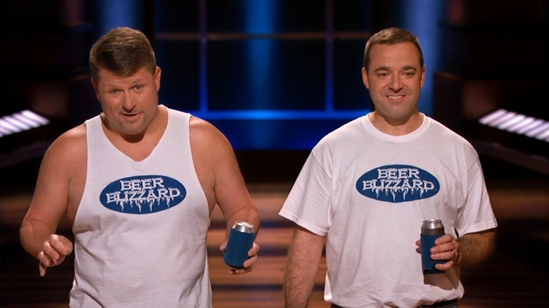 Tom Osborne and Mike Robb holding up Beer Blizzard product on Shark Tank