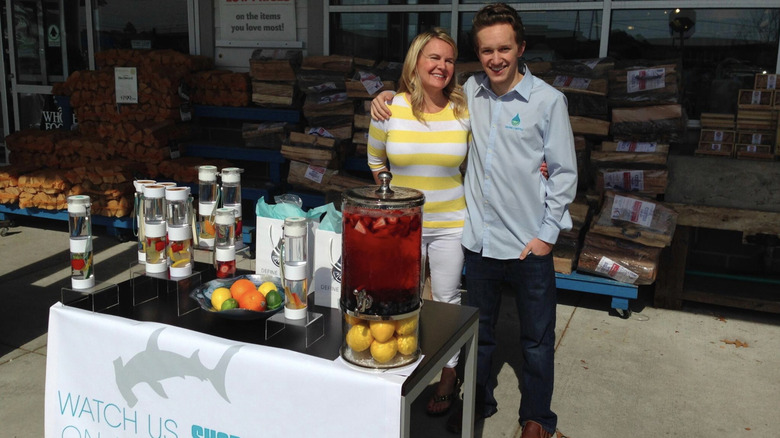 Carter Kostler in front of Whole Foods, sampling Define Bottle