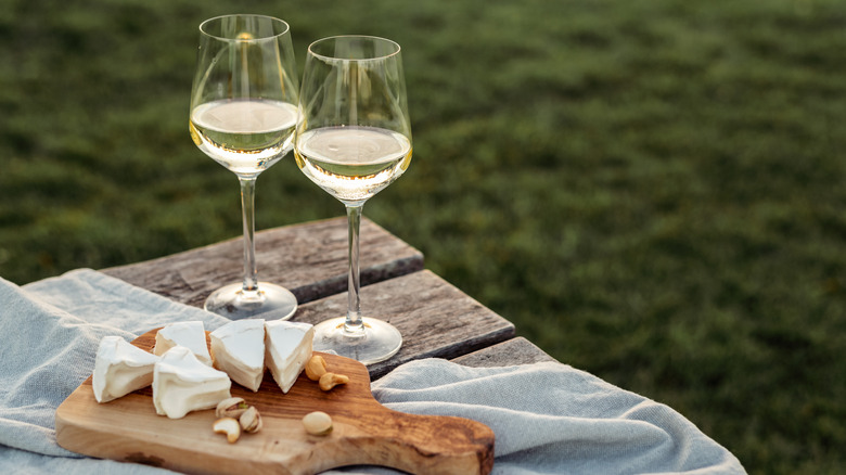 wine glasses and cheese board