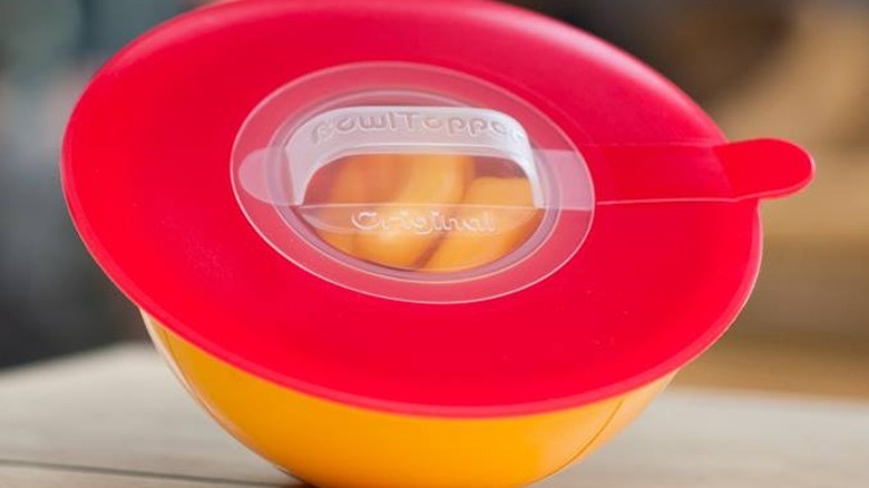 bowl topper sitting on table