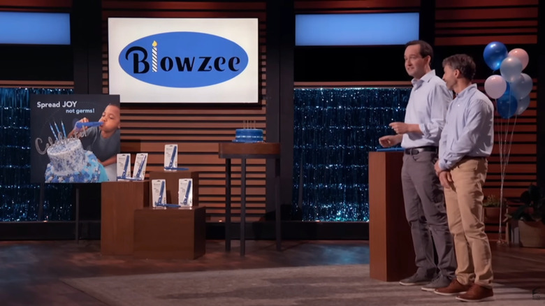 Mark Lareau and Mark Apelt stand next to their Blowzee display