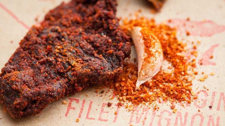 spices covering filet mignon jerky