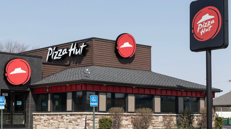 Exterior photo of a standalone Pizza Hut restaurant