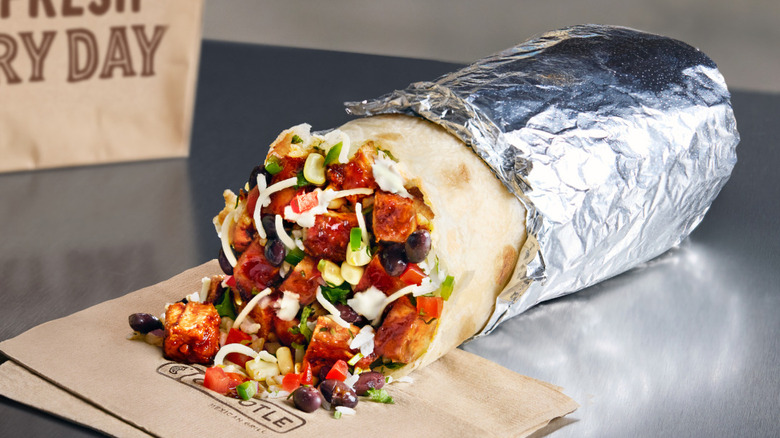 A Chipotle burrito featuring the chain's Chipotle Honey Chicken