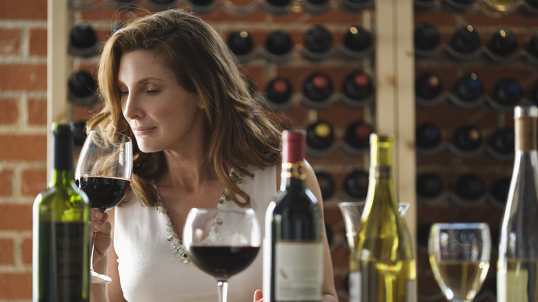 Woman tasting wine