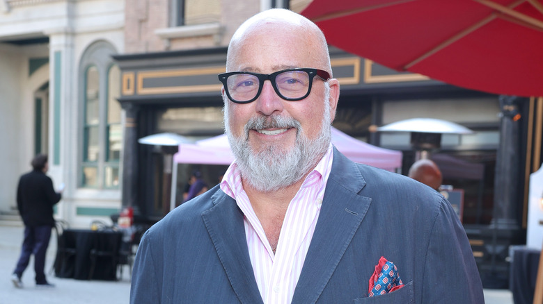 Andrew Zimmern smiling