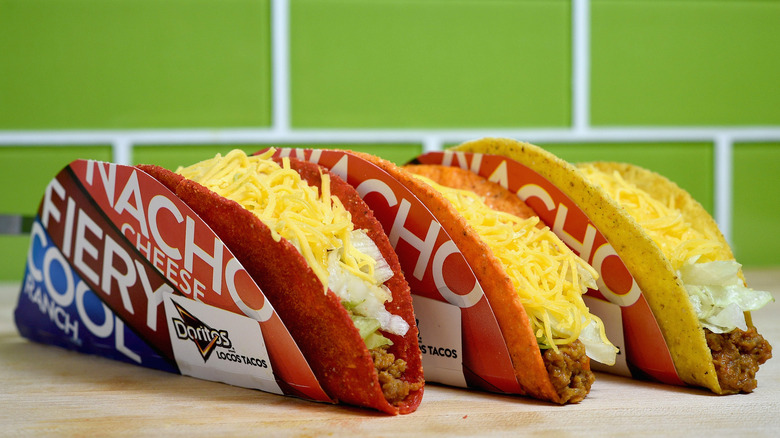 three varieties of doritos locos tacos lined up