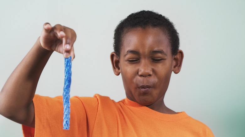 kid puckers from sour candy