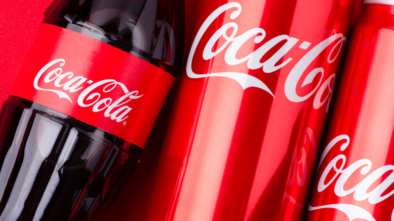 Coca-Cola cans and bottle 