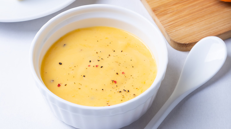 Avgolemono sauce in a ramekin