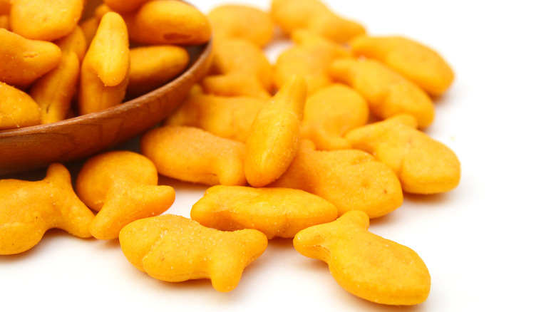Goldfish crackers in bowl and on table