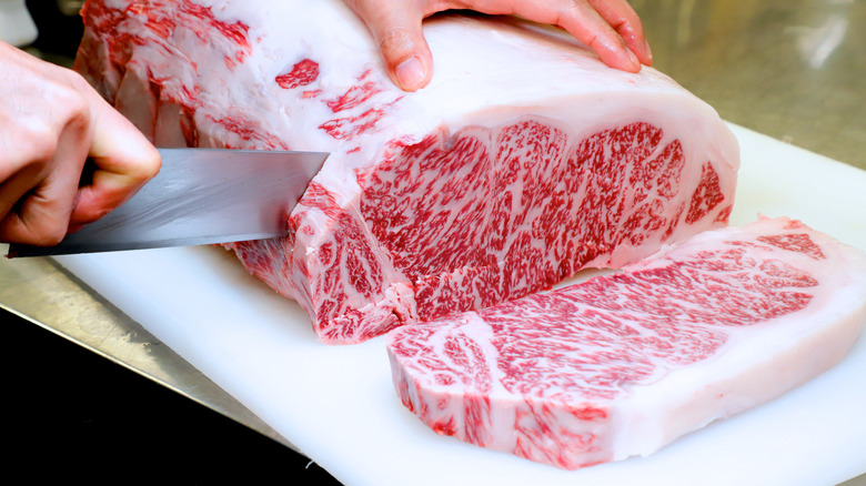 Raw meat on cutting board