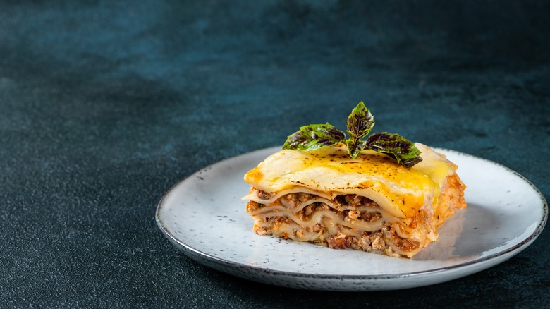 Slice of lasagne on plate