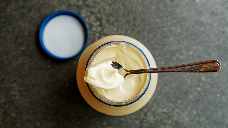 Jar of mayonnaise with spoon