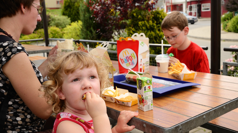 Kids eating happy meals