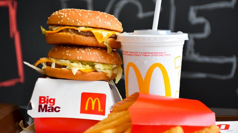 McDonald's burgers, fries, and a drink