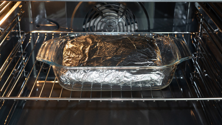 Meal cooking in a convection oven, up close