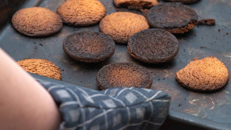sheet tray of burnt cookies