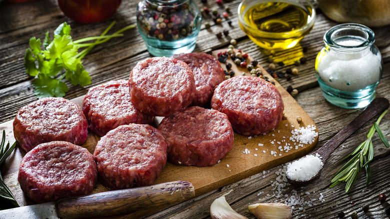 Burger patties with salt and pepper