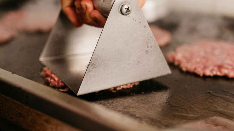Smash burgers on a griddle