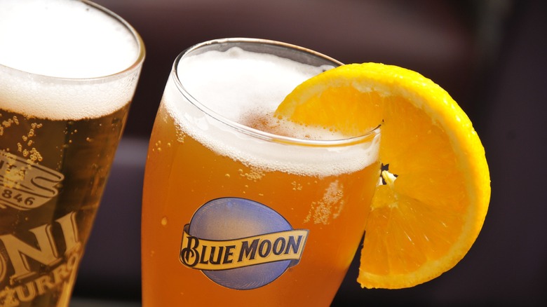 glass filled with blue moon