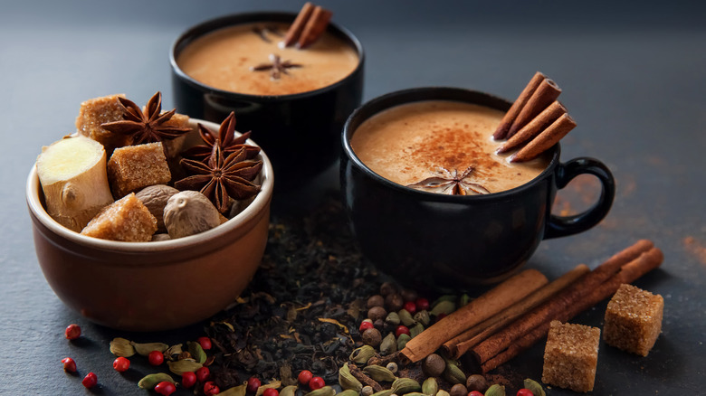 mugs of chai and spices