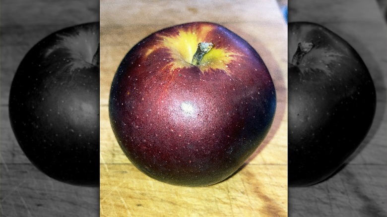 Arkansas black apple on table