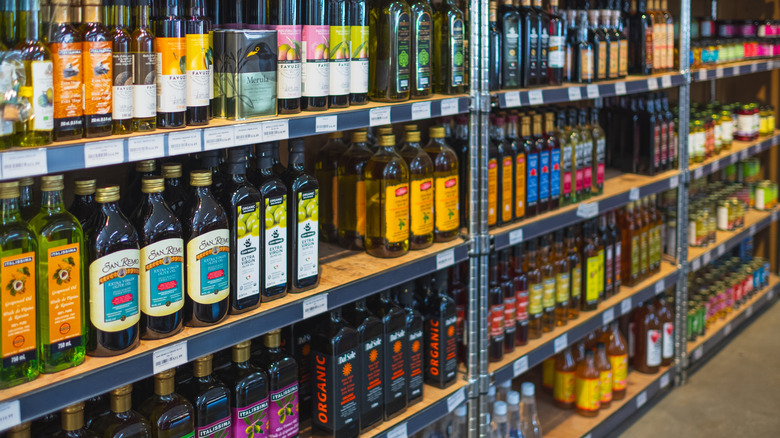 Shelves filled with bottles of cooking oils