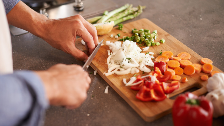 Vegetables on wooden cutting board