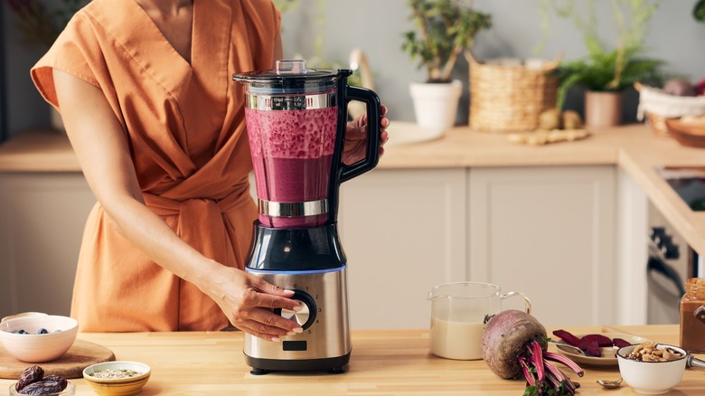 blender filled with green food