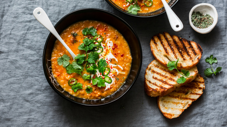 Lentil soup garnished with cilantro