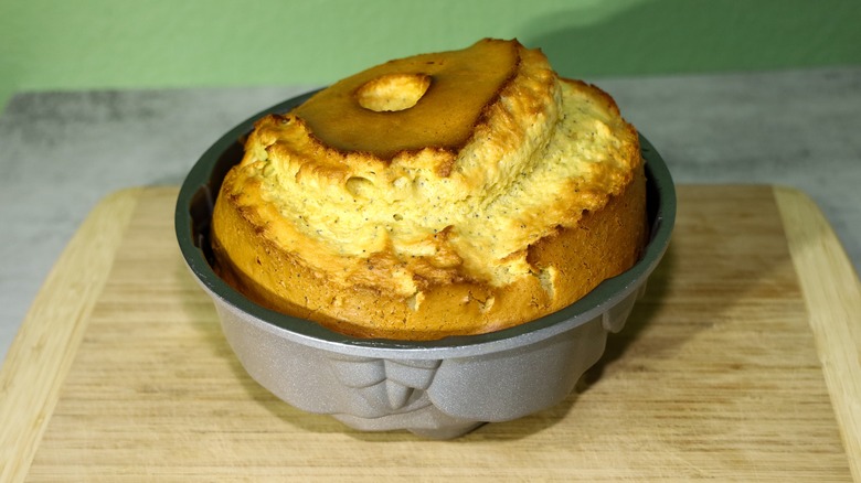 Domed cracked cake in pan