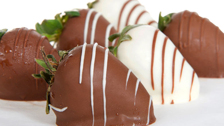 Chocolate covered strawberries with condensation on them