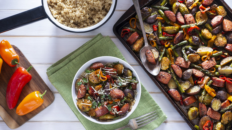 sheet pan meal on pan and in bowl on table