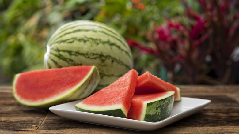Sliced and whole watermelon