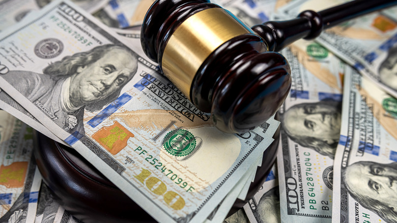 gavel over pile of money