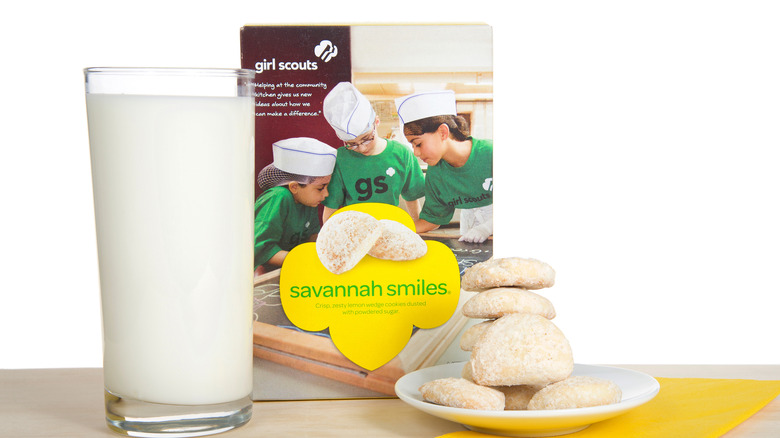 Savannah Smiles next to glass of milk