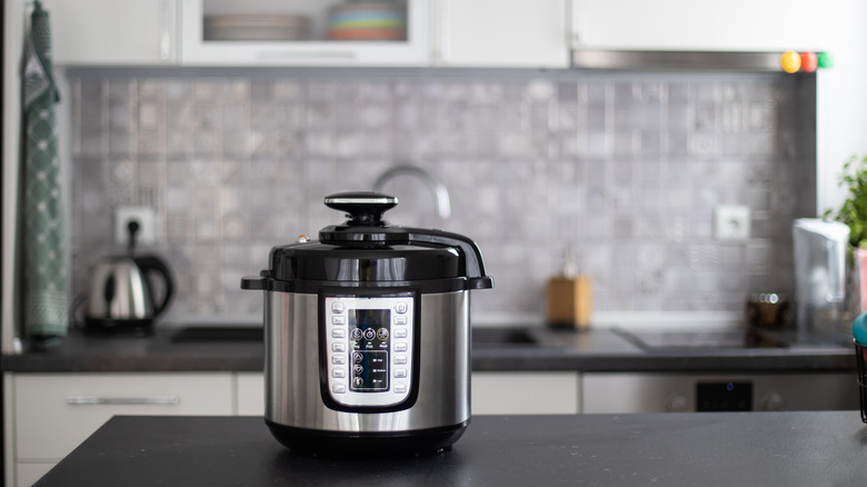A rice cooker on kitchen counter