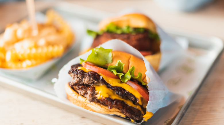 Two double cheeseburgers with cheese fries